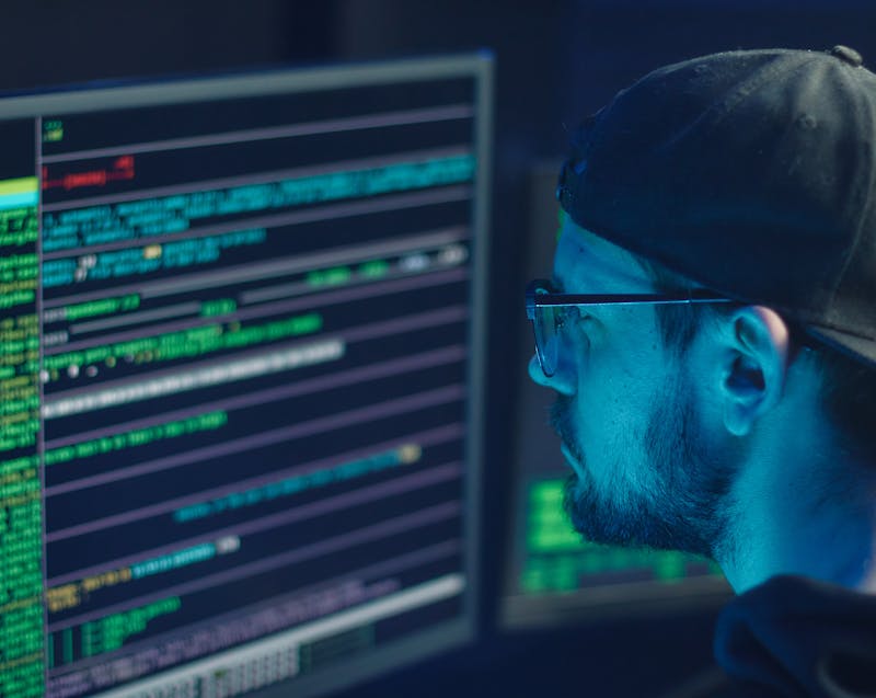 a techy guy working on his computer